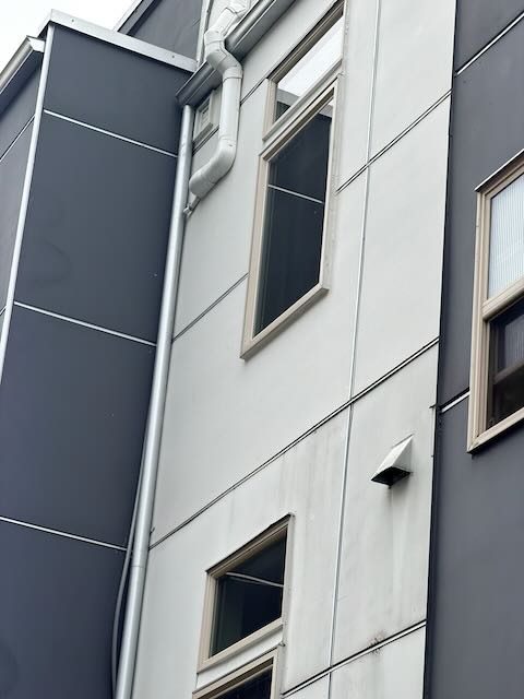 Modern panel siding installation - commercial building